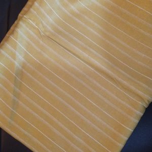 Tissu coton or rayures blanches